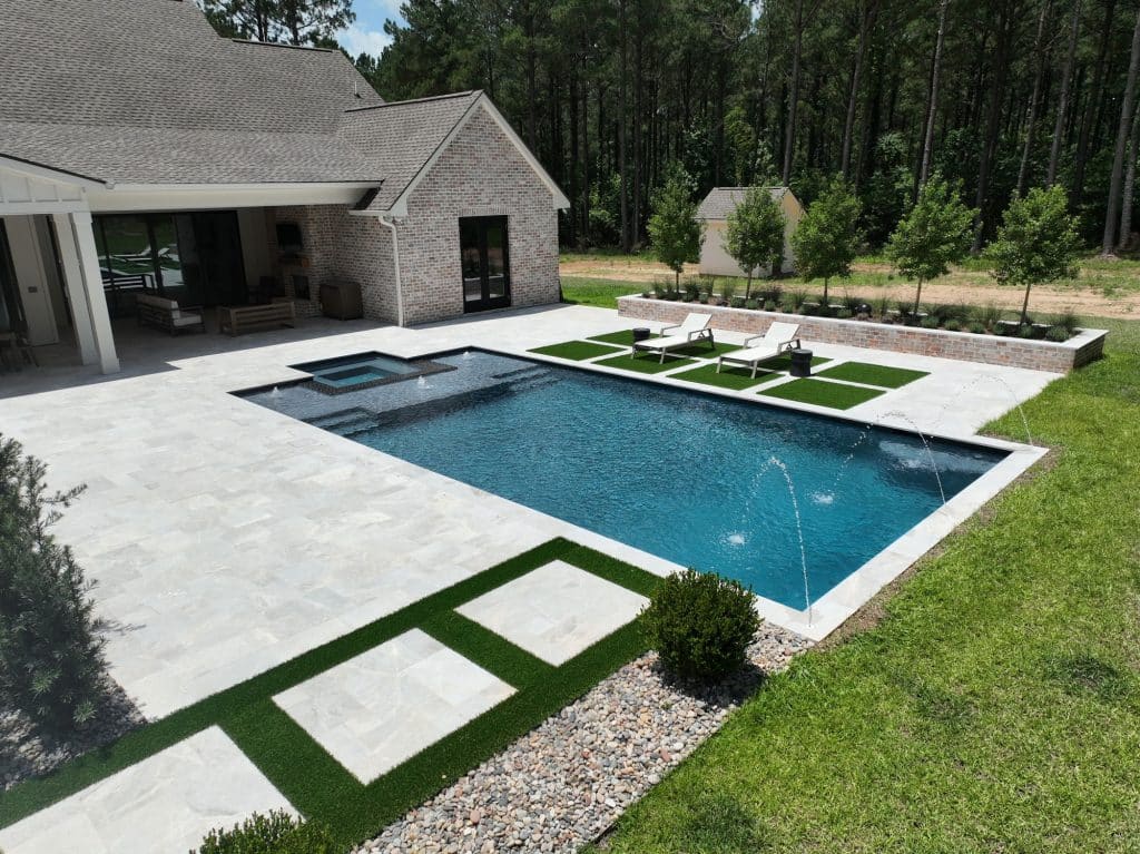 Custom geometric pool by Aquarius Pools & Spas in Mandeville, Louisiana